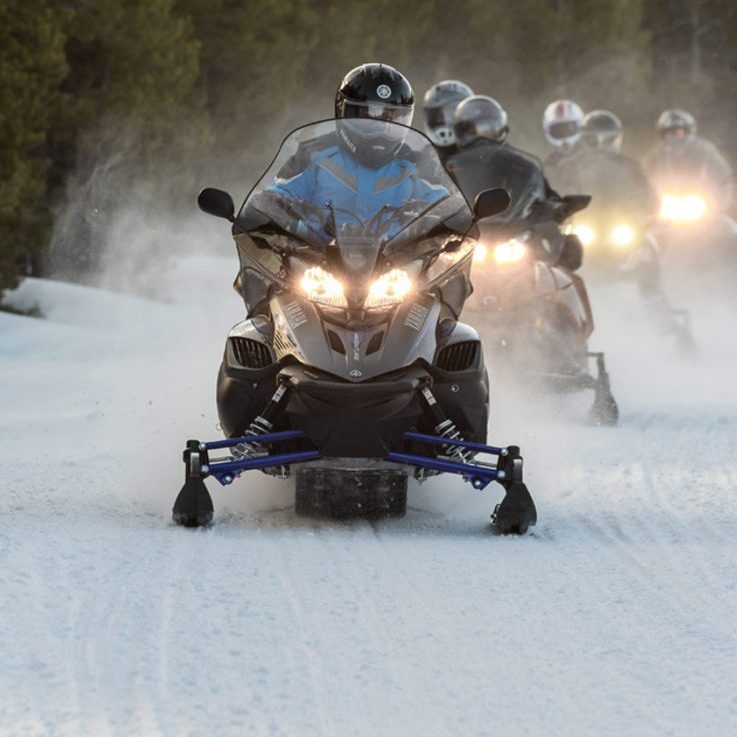 snowmobilers-riding-in-formation